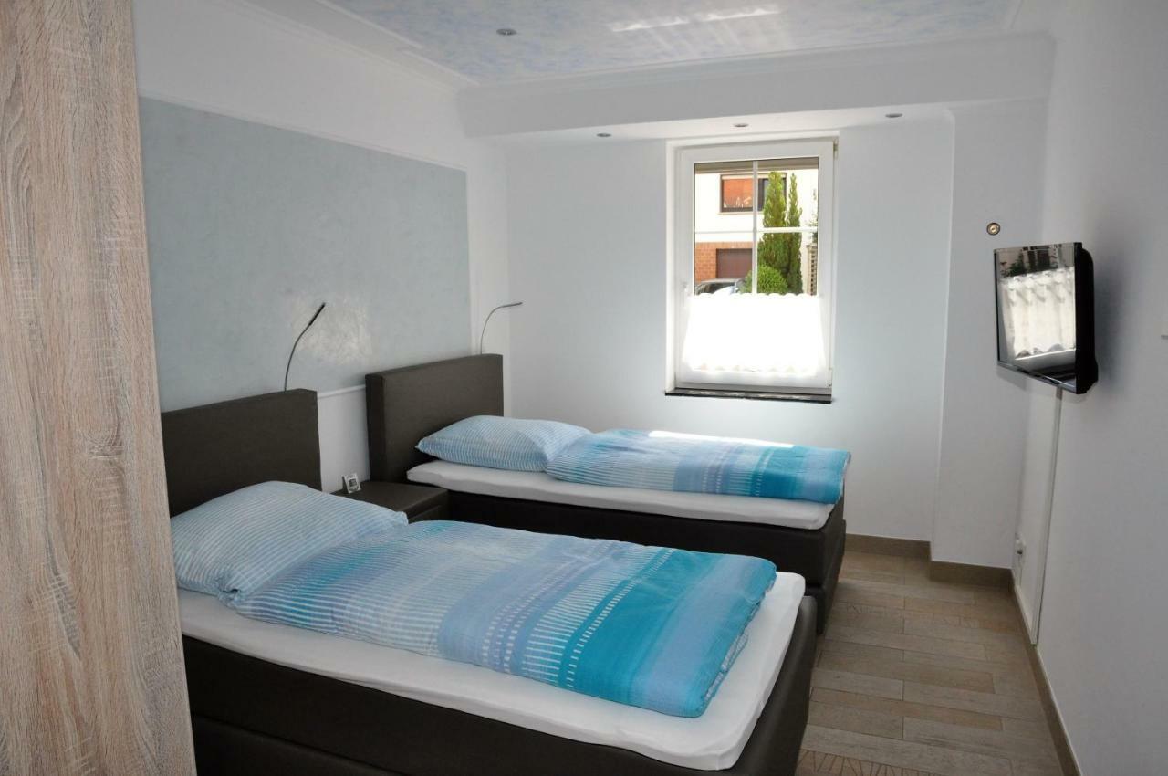 Apartmenthaus Am Zimmerplatz ホーフハイム・アム・タウヌス エクステリア 写真